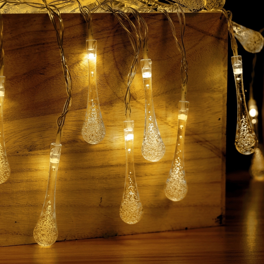 Aigostar - Cordão de luzes LED de Natal para exterior, 25 LEDs, 8 funções, 3xAA, 2,5 m, IP44, branco quente, em formato de gotas