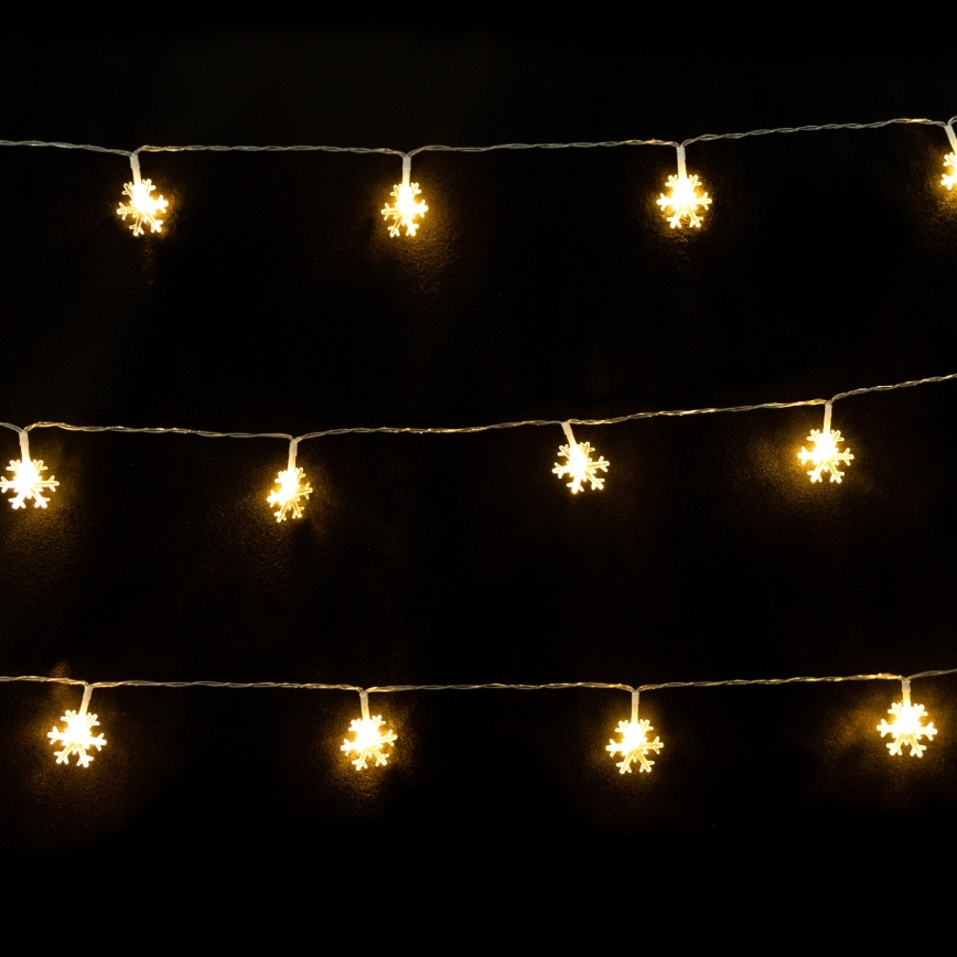 Aigostar - Cordão de luzes LED 10 LEDs / 3x pilhas AA, 1,5 m, branco quente, com flocos de neve