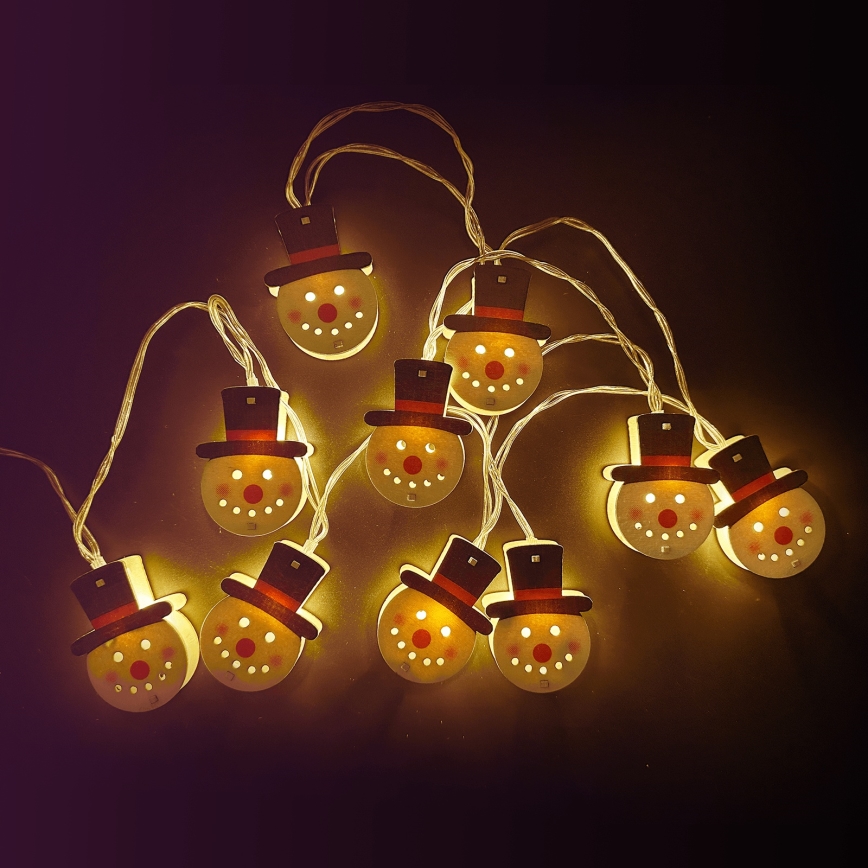 Aigostar - Cordão de luzes LED 10x LED/3x AA, 1,5 m, branco quente, boneco de neve