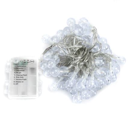 Aigostar - Cadeia de luzes de Natal LED para exterior 100 LEDs/8 funções 3x pilhas AA 10,3 m IP44 multicolorido