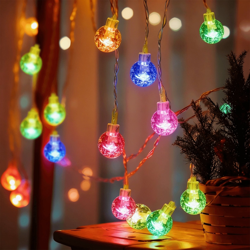 Aigostar - Guirlanda LED de Natal para exterior 50xLED/8 funções 3xAA 5,3m IP44 multicolorido