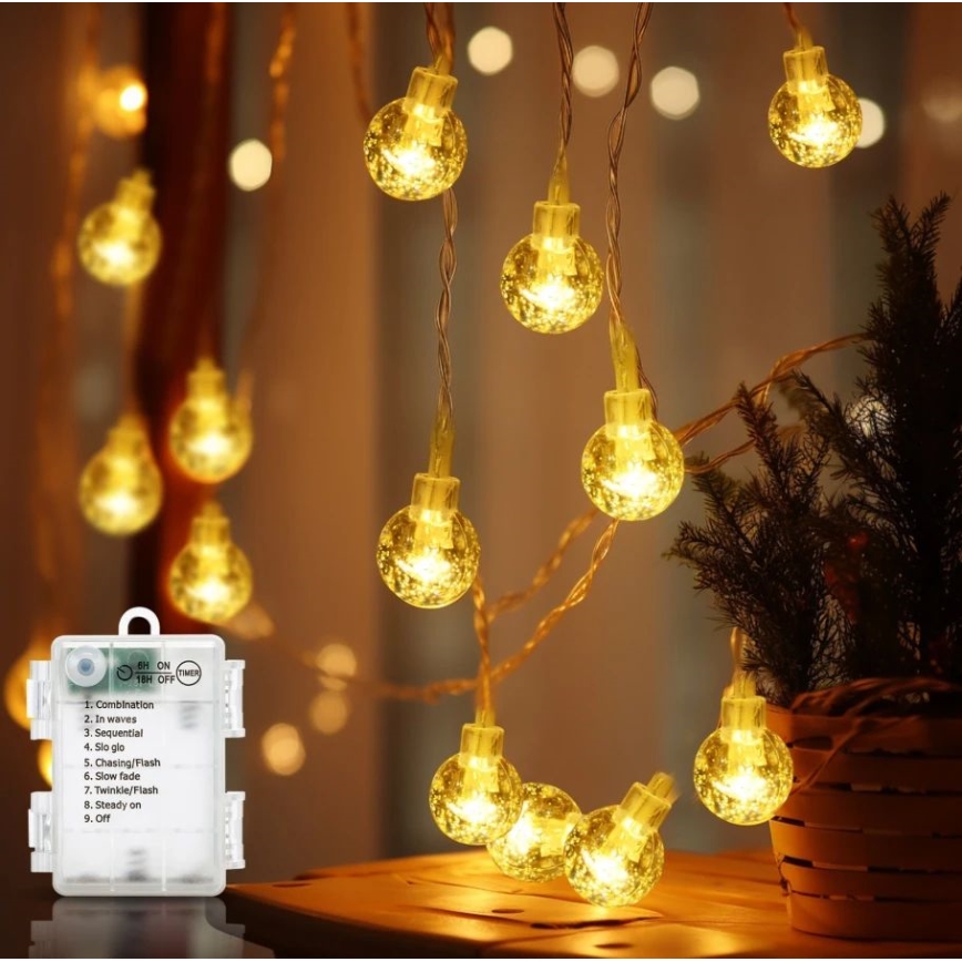 Aigostar - Cordão LED para exterior 100xLED/3xAA/8 funções 10,3 m IP44 branco quente