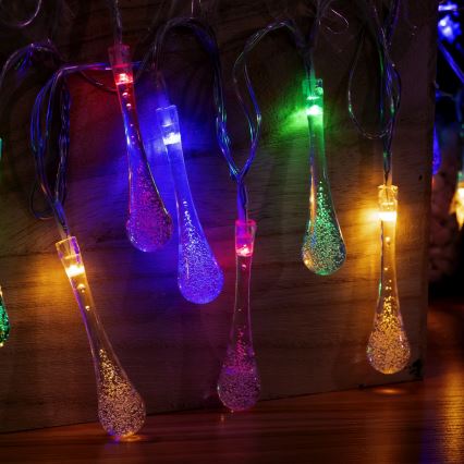 Aigostar - Guirlanda de LED para exterior, 25 LEDs / 8 funções, 3xAA, 2,5 m, IP44, gotas multicoloridas