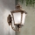 Aplique de parede exterior AIKO 1xE27/60W/230V IP23 bronze/pátina