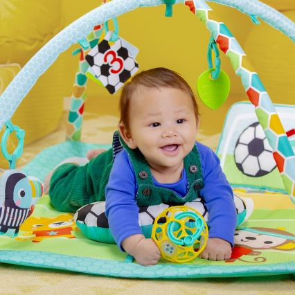 Bright Starts - Tapete de atividades para bebé OBALL GRIP & KICK 3xAA