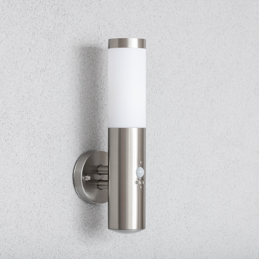 BRILAGI - Aplique de parede exterior com sensor ELIA 1xE27/20W/230V IP44 cromado fosco