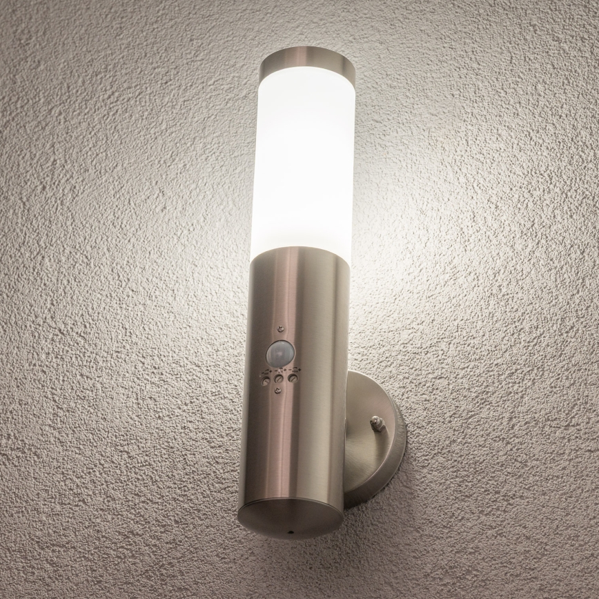 BRILAGI - Aplique de parede exterior com sensor ELIA 1xE27/20W/230V IP44 cromado fosco