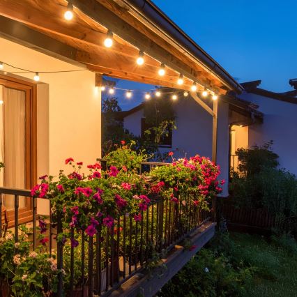 Brilagi - Guirlanda decorativa LED para exterior 25xE12/0,6W/230V 20m preta IP44 branco quente + comando à distância