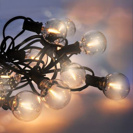 Brilagi - Guirlanda decorativa LED para exterior 25xE12/0,6W/230V 20m preta IP44 branco quente + comando à distância