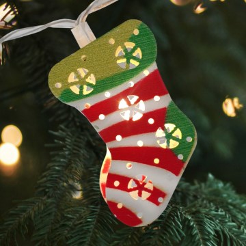 Cadeia de luzes LED de Natal para exterior 10xLED/2xAA 1,65 m IP44 branco quente meias