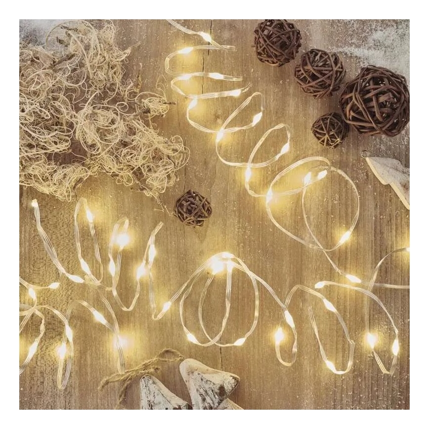 Cadeia de luzes LED exterior para Natal 160xLED/21m IP44 branco quente