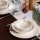 Conjunto de jantar de 18 peças em porcelana — branco, verde e amarelo