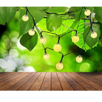 Cadeia Solar LED 30xLED/8 funções 300 mAh 4,9m IP44 branco quente