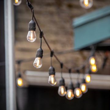 Corrente decorativa exterior LED BAJA ST64 20xE27/1W/230V 10,9m IP44 branco quente