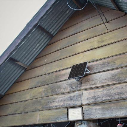 Holofote LED solar para exterior com regulação LED/6W/3,2V IP65 4000K 5000 mAh preto + comando