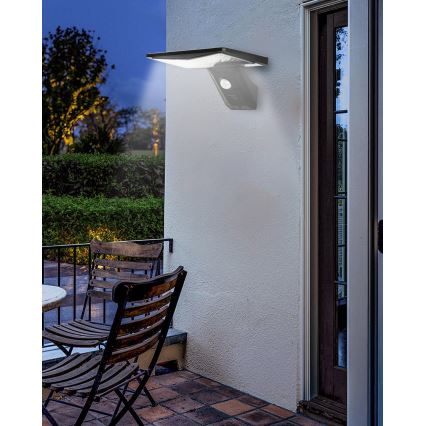 Iluminação solar de parede LED com sensor LED/2,6W/5,5V IP65 1800 mAh preto