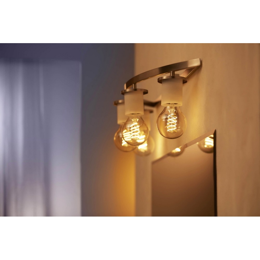 Lâmpada LED com regulação Philips Hue WHITE FILAMENT A60 E27/7W/230V 2100K