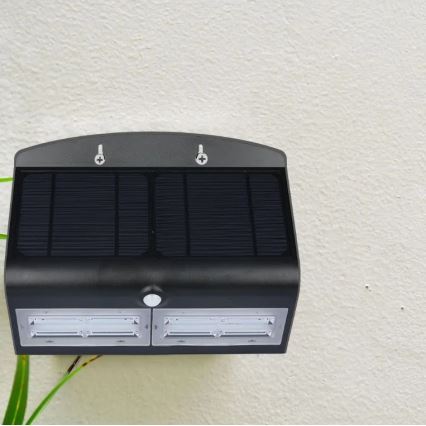 Luminária de parede solar LED com sensor LED/7W/3,7V 4000K IP65 4000 mAh preta