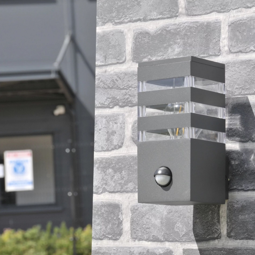 Luminária de parede exterior com sensor TEKSAS 1xE27/12W/230V IP44 antracite