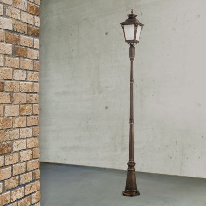 Candeeiro de exterior AIKO 1xE27/60W/230V 240 cm IP23 bronze/patina