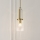 Quintiesse - Lustre com haste KIMROSE 1xE27/60W/230V Ø 17,8 cm dourado