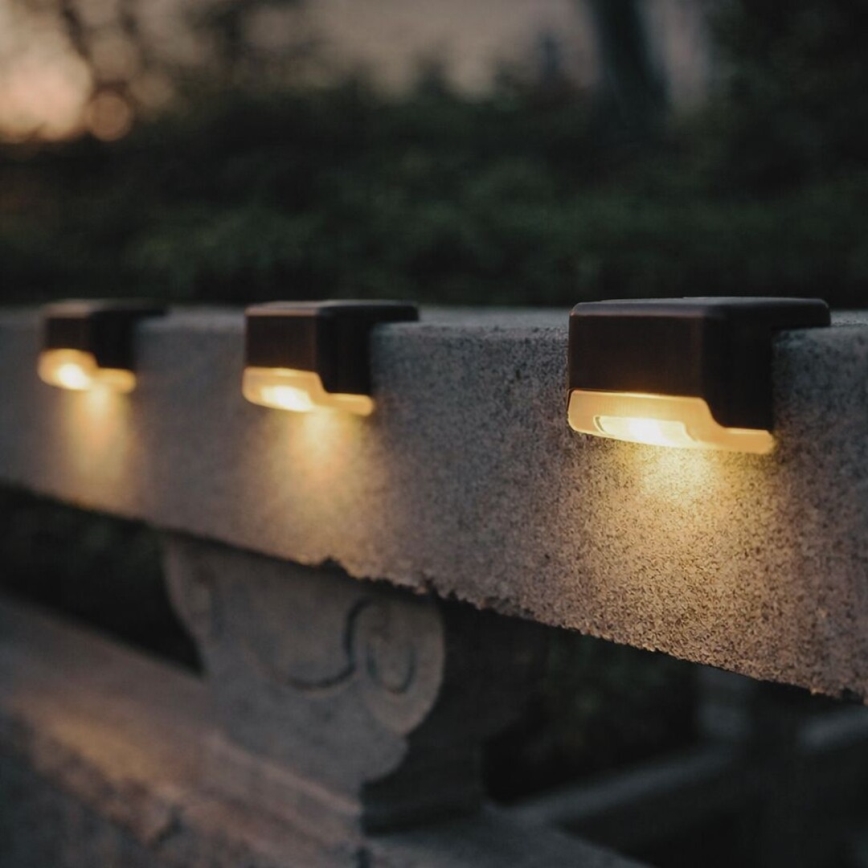 Rabalux - Conjunto de 4 apliques de parede solares LED com sensor de crepúsculo LED/0,06W/1,2V 300 mAh IP44