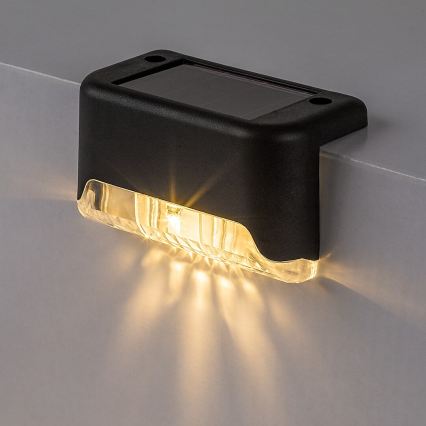 Rabalux - Conjunto de 4 apliques de parede solares LED com sensor de crepúsculo LED/0,06W/1,2V 300 mAh IP44