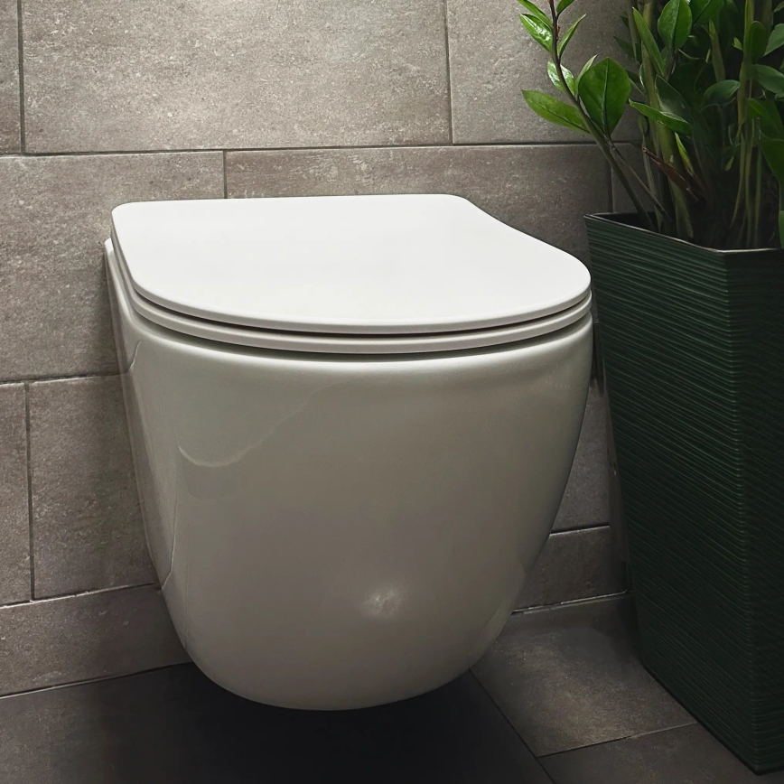 REA-C1259 - Sanita suspensa com assento CARLO MINI TORNADO RIMLESS cerâmica/branco brilhante