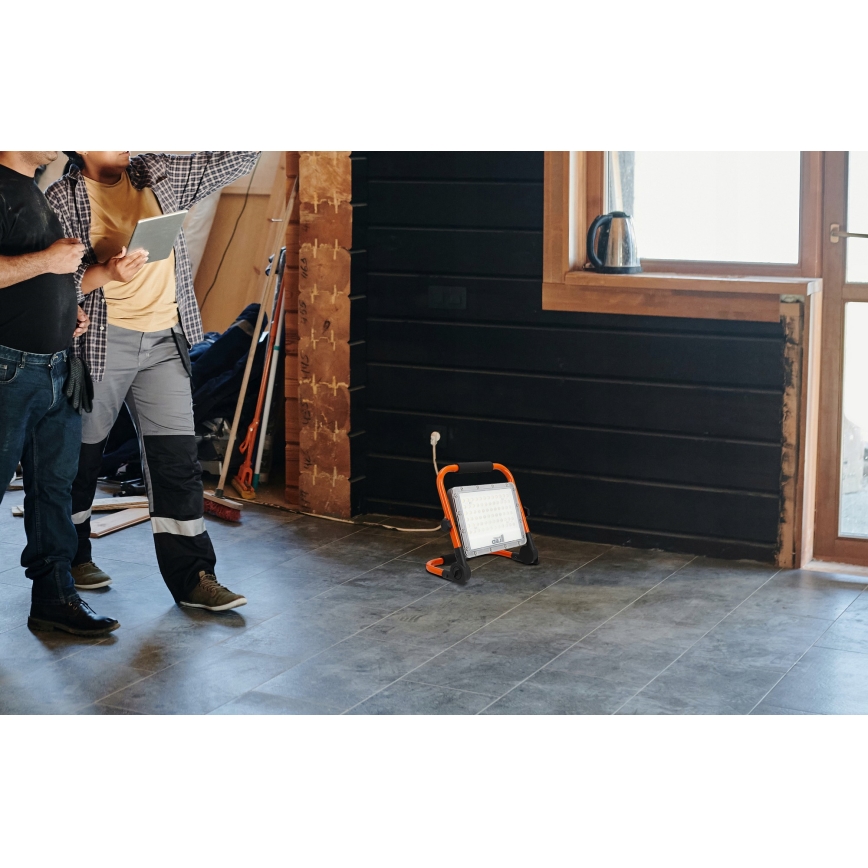 Refletor LED com tripé LED/100W/230V 4500K IP65 laranja