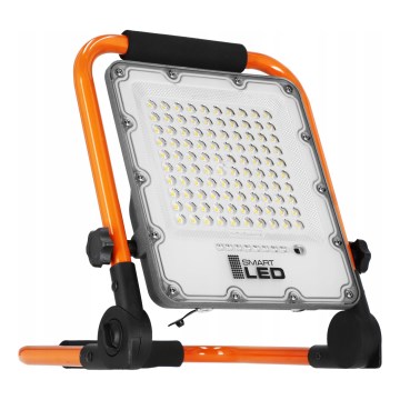 Refletor LED recarregável com tripé LED/50W/3,2V 4500K 10000 mAh IP65 laranja