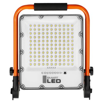 Refletor LED recarregável com tripé LED/50W/3,2V 4500K 5000 mAh IP65 laranja