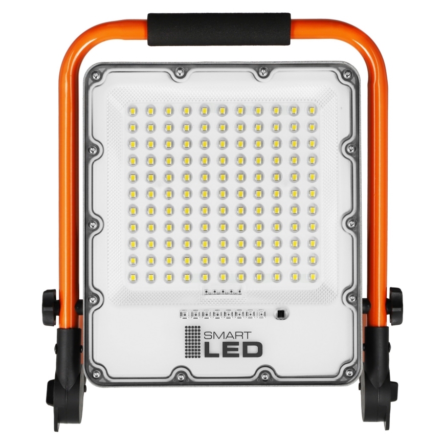 Refletor LED recarregável com tripé LED/50W/3,2V 4500K 5000 mAh IP65 laranja