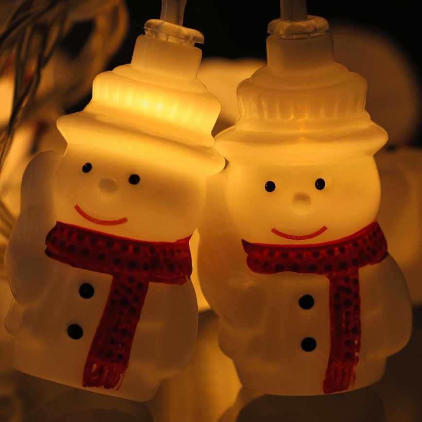 Cordão de luzes LED 20 LEDs / 3x pilhas AA / branco quente / 3,3 m - bonecos de neve