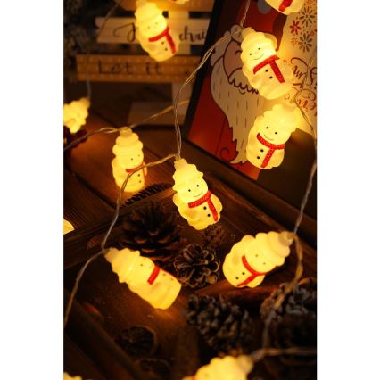 Cordão de luzes LED 20 LEDs / 3x pilhas AA / branco quente / 3,3 m - bonecos de neve