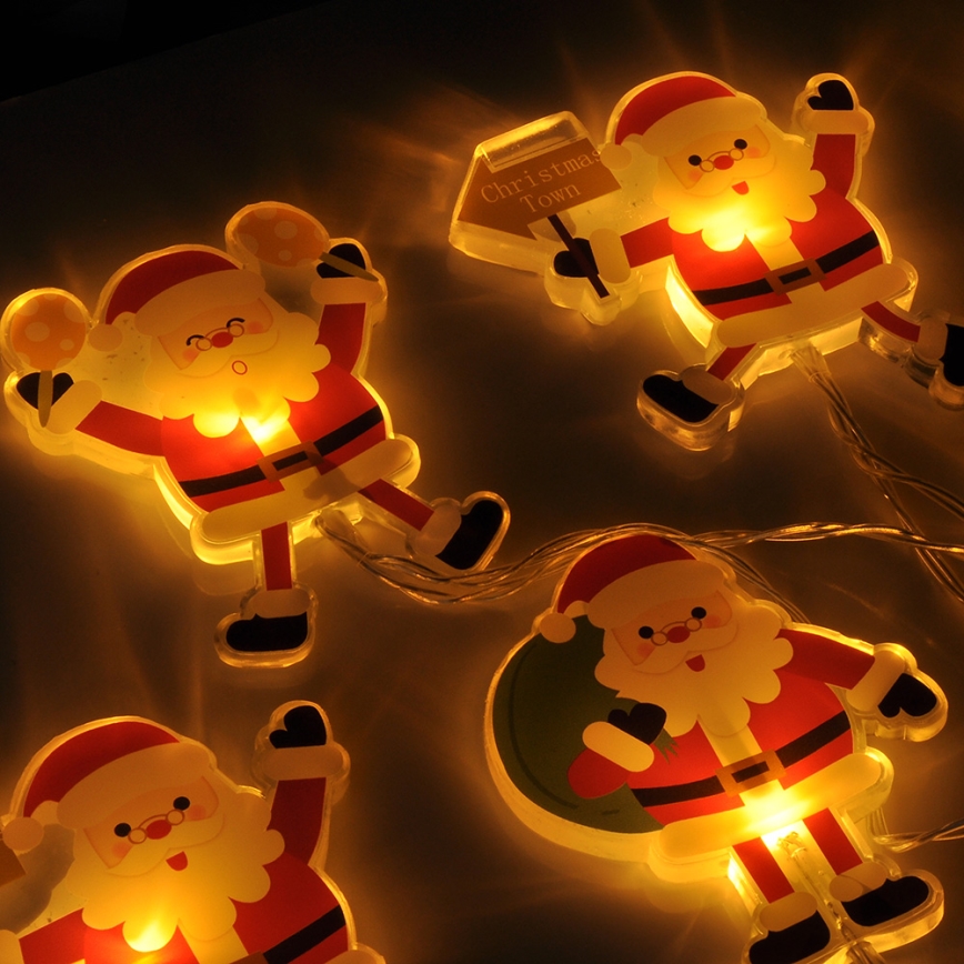 Cordão de LED com ventosas 6xLED/2xAA 1,2m branco quente Papai Noel