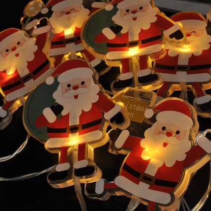 Cordão de LED com ventosas 6xLED/2xAA 1,2m branco quente Papai Noel