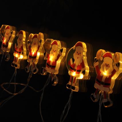 Cordão de LED com ventosas 6xLED/2xAA 1,2m branco quente Papai Noel