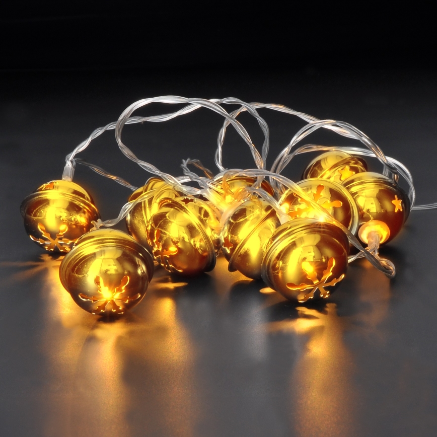 Cadeia de luzes de Natal LED 10xLED/2xAA/branco quente 1,8m com guizos